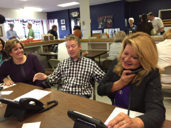 GOP Chair Jennifer Horn, left, with U.S. Sen. Rand Paul, R-KY, center and Gail Huff, Scott Brown's wife, manning the phones in Manchester.