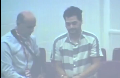 Screenshot from video extradition hearing  for Matthew Dion, June 4.