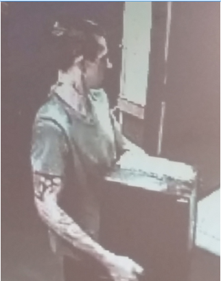Secondary surveillance photo of Subway robber.
