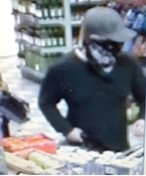 Robber inside the Eddy Road Mobil on Aug. 4.