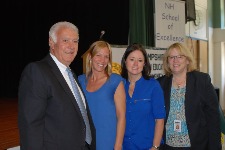 Superintendent Debra Livingston, far right, principal  Amy Allen, and Mayor Ted Gatsas were at the school  assembly to congratulate Ashley Preston, second from left.