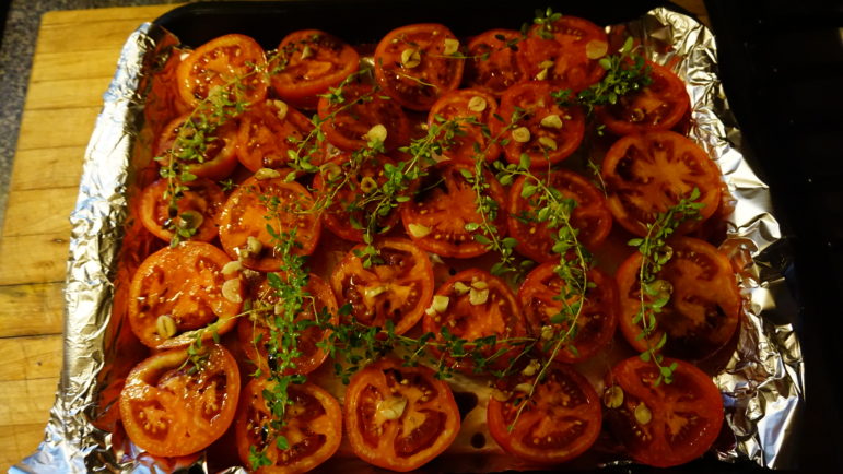 Tomatoes, whole-roasted in olive oil.
