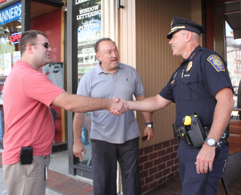 Chief Willard gets a warm welcome as new chief during "Coffee with a Cop" at Cafe la Reine.
