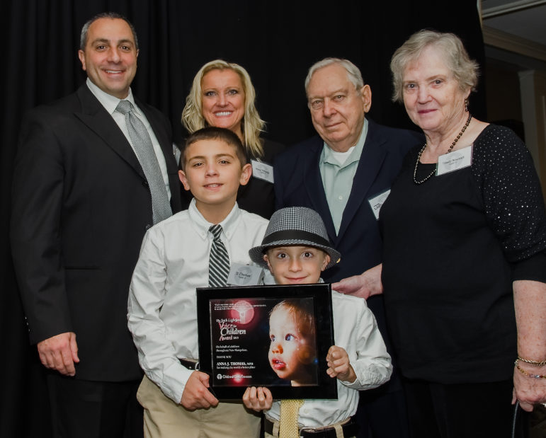 Voice for Children Award Winner Anna Thomas and family, from left: Husband, John Thomas; sons, John or “JJ” (age 10), and Chase (age 6); Anna Thomas; Anna's father, John Noetzel, and mother, Trudy Noetzel.