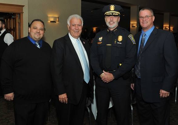 From left, Hector Andujar Jr., Mayor Ted Gatsas, Chief Nick Willard and Pastor Stephen Gordomski, at the recent Teen Challenge annual fundraising banquet at Executive Court.