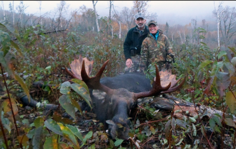 Richard & Yvette Paris of Auburn, NH with their 3 1/2 year old 625 lb. bull.