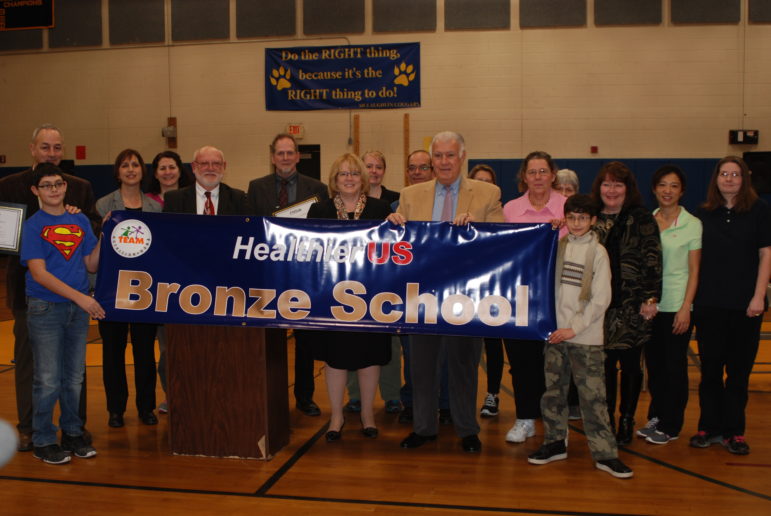 McLaughlin Middle School students celebrate their healthy achievement.