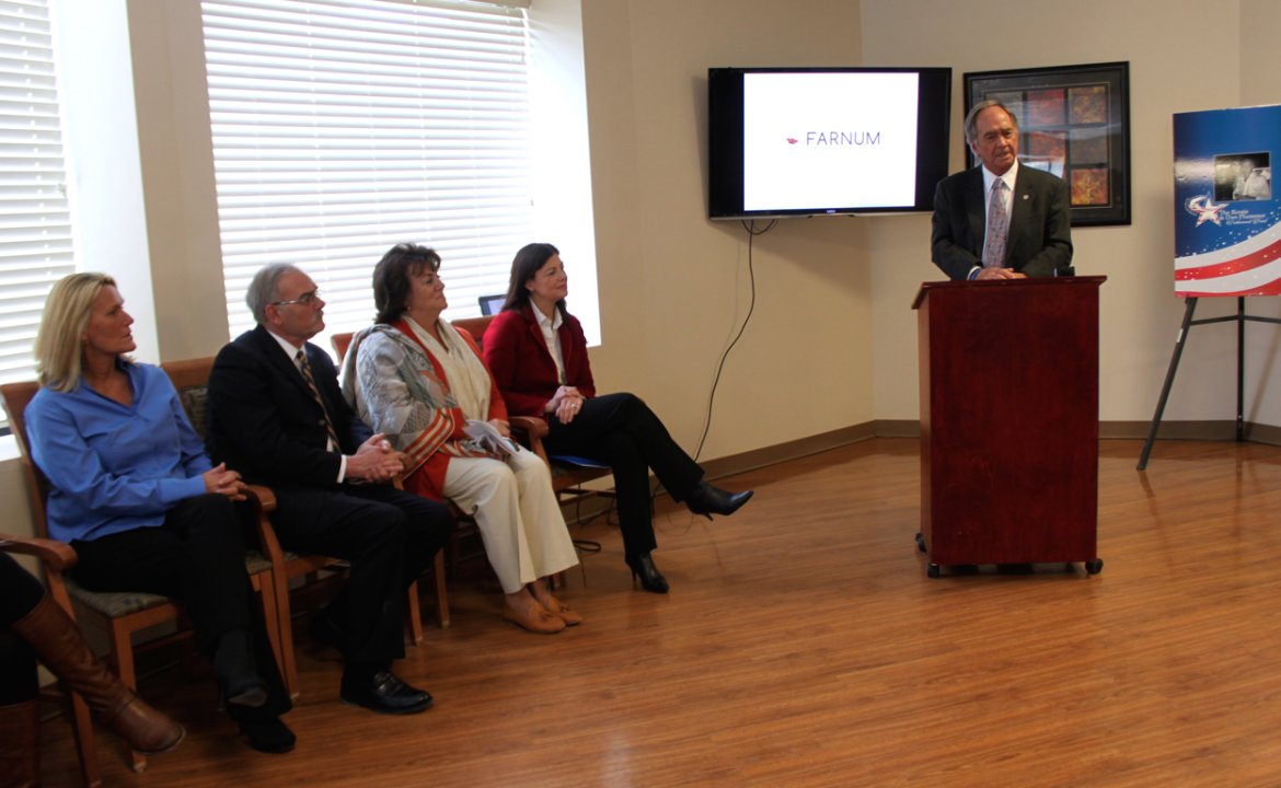 Farnum Center CEO Larry Gammon speaks during a big announcement regarding expanded services for veterans at Farnum Center. From left, Cheryl Wilkie of Farnum Center, Dan Plummer, Renee Plummer and Sen. Kelly Ayotte, R-NH.
