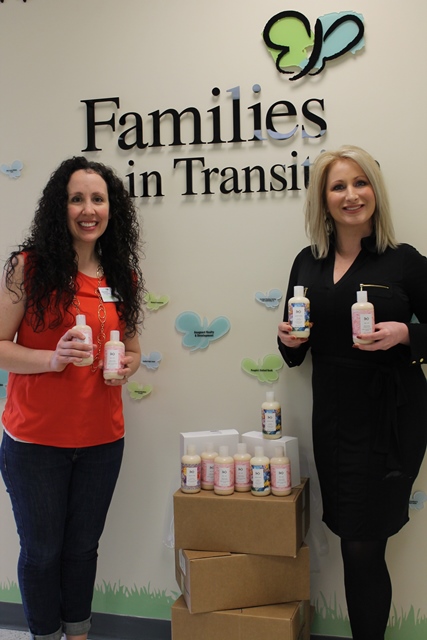 From left, Donor Relations Manager for Families in Transition NH Pamela Hawkes, with Kelley Seavey of Hooksett, a senior stylist at H2O Salon Spa in Bedford, with some of the R+Co shampoos and conditioners that were donated.