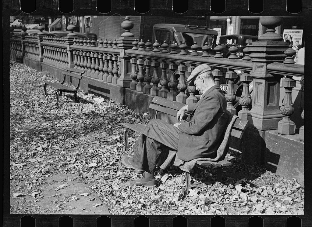 By not breaking a sweat, this gentleman relaxing at the Merrimack Common (circa 1936) was actually breaking one of Manchester’s silliest blue laws.