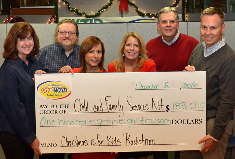 WZID’s Deb Davidson, Jeff Edwards, Marga Bessette, Peg James, Pat McKay, and Neal White, present the big check to the private, nonprofit, Child and Family Services, to aid NH children and their families through the holidays and beyond.  The check represents the results of the 18th annual WZID Christmas is for Kids Radiothon, presented by FairPoint Communications.