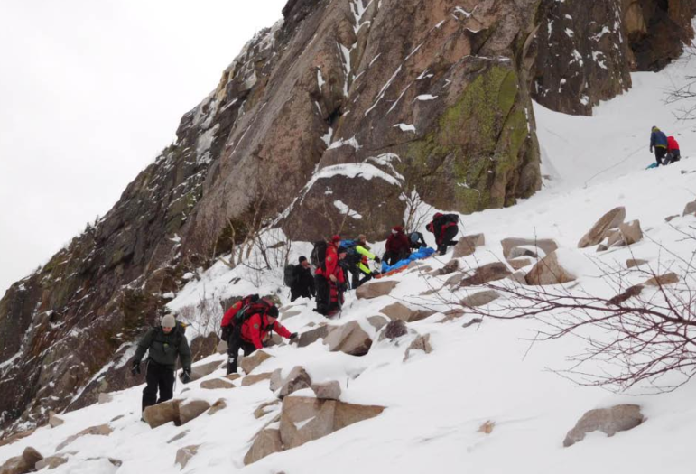 Fourteen hikers, described by NH Fish & Game as 'good Samaritans,' assisted in carrying an injured ice climber from Cannon Cliff on Saturday.