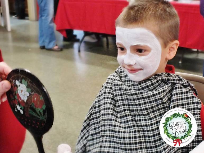 Anderson Brock of Manchester gets his face painted at Brookside Church Craft Fair Christmas at the Brook