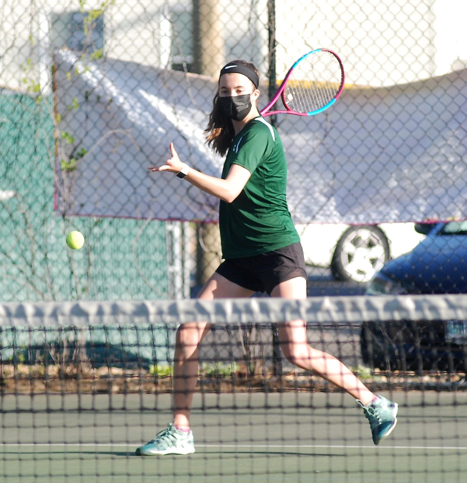 Emily Leclerc playing tennis.