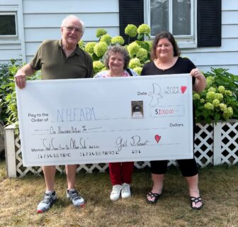 Local author presents check for $1,000 to New Hampshire Foster and Adoptive Parent Association