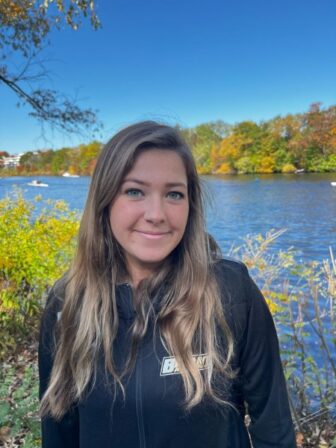 Manchester rower captaining Bryant University’s first appearance in Head of Charles Regatta