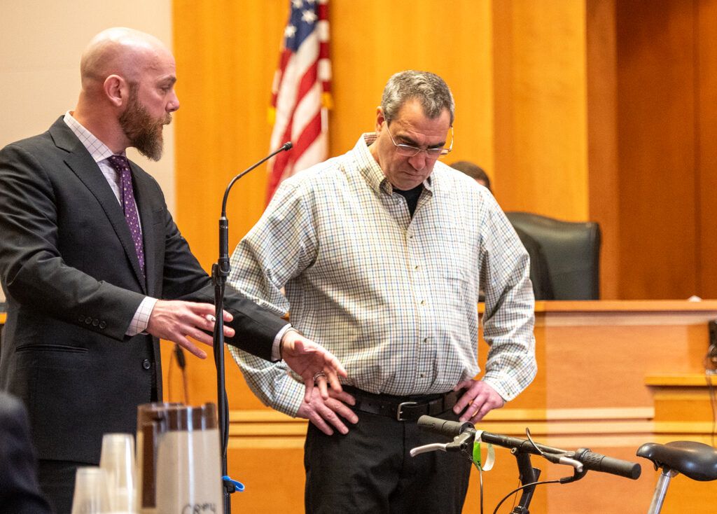 Assistant Hillsborough County Attorney Steven Gahan asks questions of Patrick Lessard of the Bike Barn. Lessard inspected the bicycle for Manchester Police after the fatal accident.